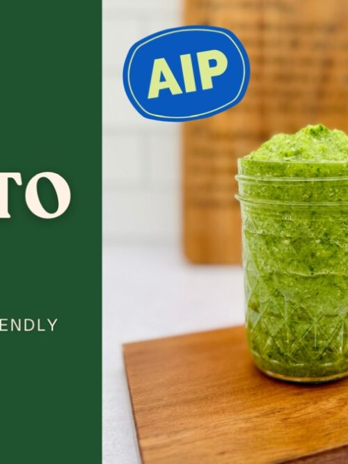 Sofrito in a jar showing a vibrant green AIP-friendly Puerto Rican sofrito recipe made with fresh herbs and blended vegetables on a wooden board