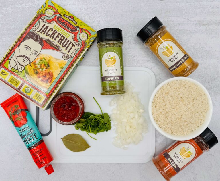 Ingredients for plant based arroz con pollo including jackfruit, rice, spices, and vegetables for easy vegan meal prep ideas.
