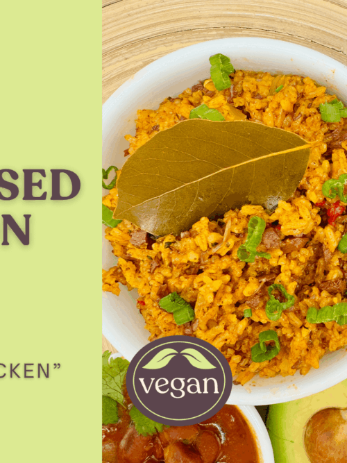 Plant based arroz con pollo rice bowl with green onions and bay leaf, a great option for vegan recipes and meatless dinner ideas.